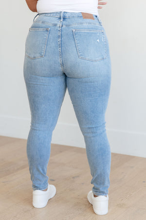 Judy Blue Mid Rise Tummy Control Distressed Light Wash Skinny Jeans
