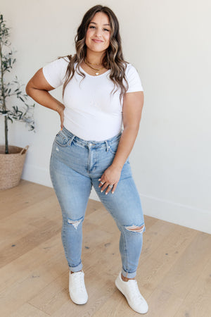 Judy Blue Mid Rise Tummy Control Distressed Light Wash Skinny Jeans