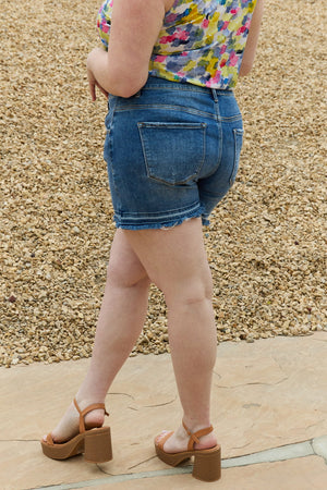 RISEN Mid Rise Raw Release Hem Asymetrical Shorts