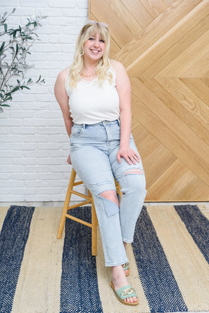 Risen High Waist Light Wash Distressed Jeans