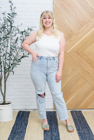 Risen High Waist Light Wash Distressed Jeans